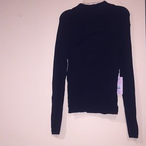 Cute large black long sleeve shirt with an opening